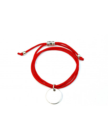 Pulsera elástica y medalla