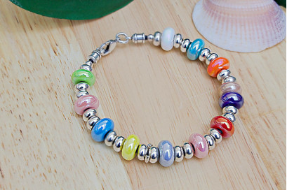 Pulseras bolitas chatas colores